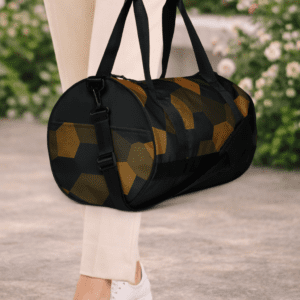 Sac de voyage noir et or. Compact, structuré et résistant. Idéal pour vos trajets courts et vos séances de sport