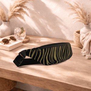 Sac banane noir et or compact, pratique et élégant. Idéal pour garder vos essentiels à portée de main.