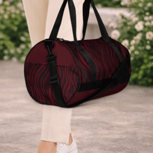 Sac de voyage rouge. Compact, structuré et résistant. Idéal pour vos trajets courts et vos séances de sport