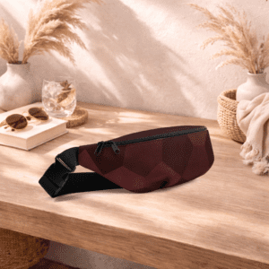 Sac banane rouge compact, pratique et élégant. Idéal pour garder vos essentiels à portée de main.