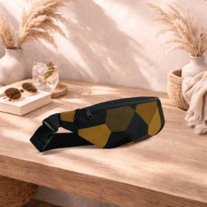 Sac banane noir et or compact, pratique et élégant. Idéal pour garder vos essentiels à portée de main.