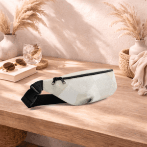 Sac banane ivoire compact, pratique et élégant. Idéal pour garder vos essentiels à portée de main.